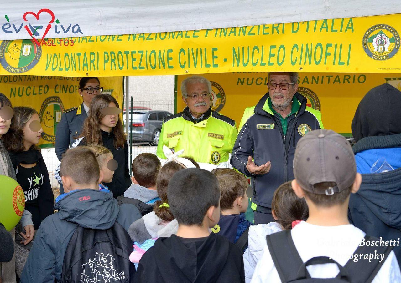 Finance Guard officers meeting families at an EVVIVA event